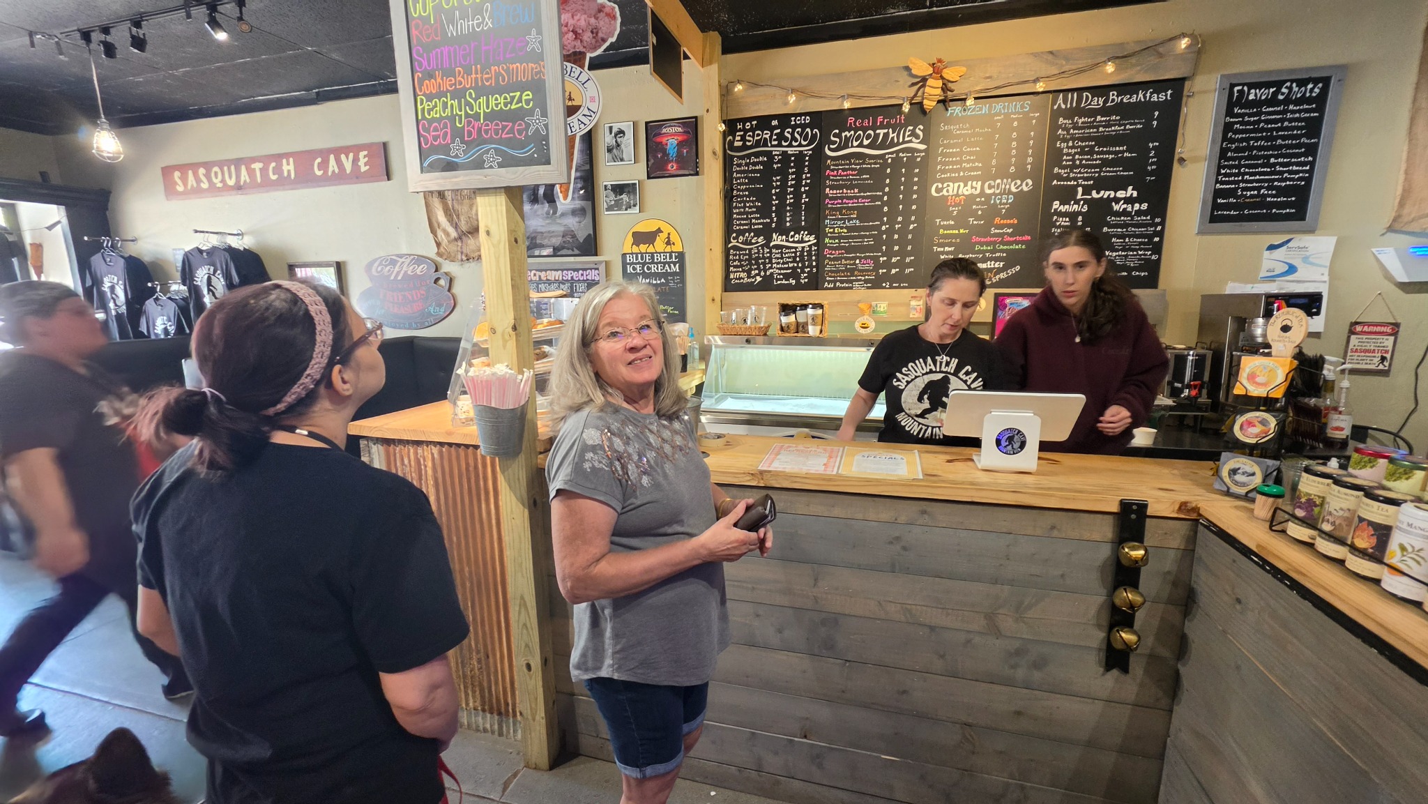 A visit with friends at the Sasquatch Cave counter.